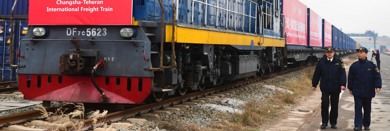 Chinese customs officers check a freight train of China Railway Express running from Changsha to Tehran. 