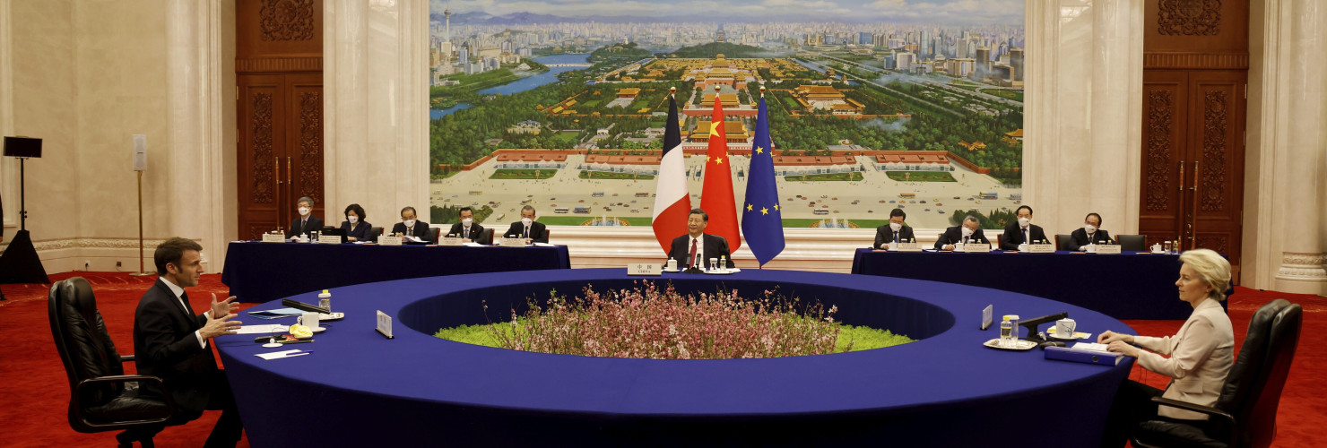 China's President Xi Jinping, center, his French counterpart Emmanuel Macron, left, and European Commission President Ursula von der Leyen meet for a working session in Beijing Thursday, April 6, 2023.