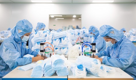 Workers rushed to make export masks. Hai'an City, Jiangsu Province, China